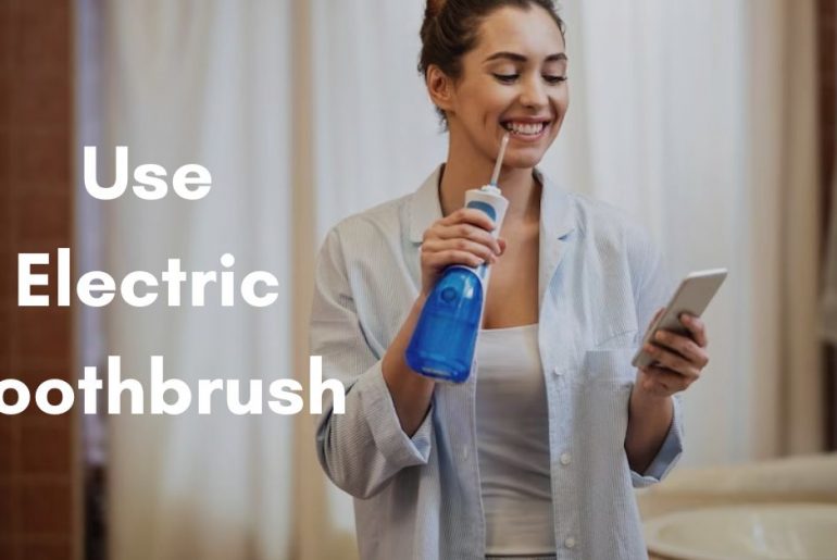 how to use electric toothbrush